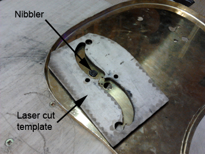 homemade Resonator Guitar f-holes nibbling